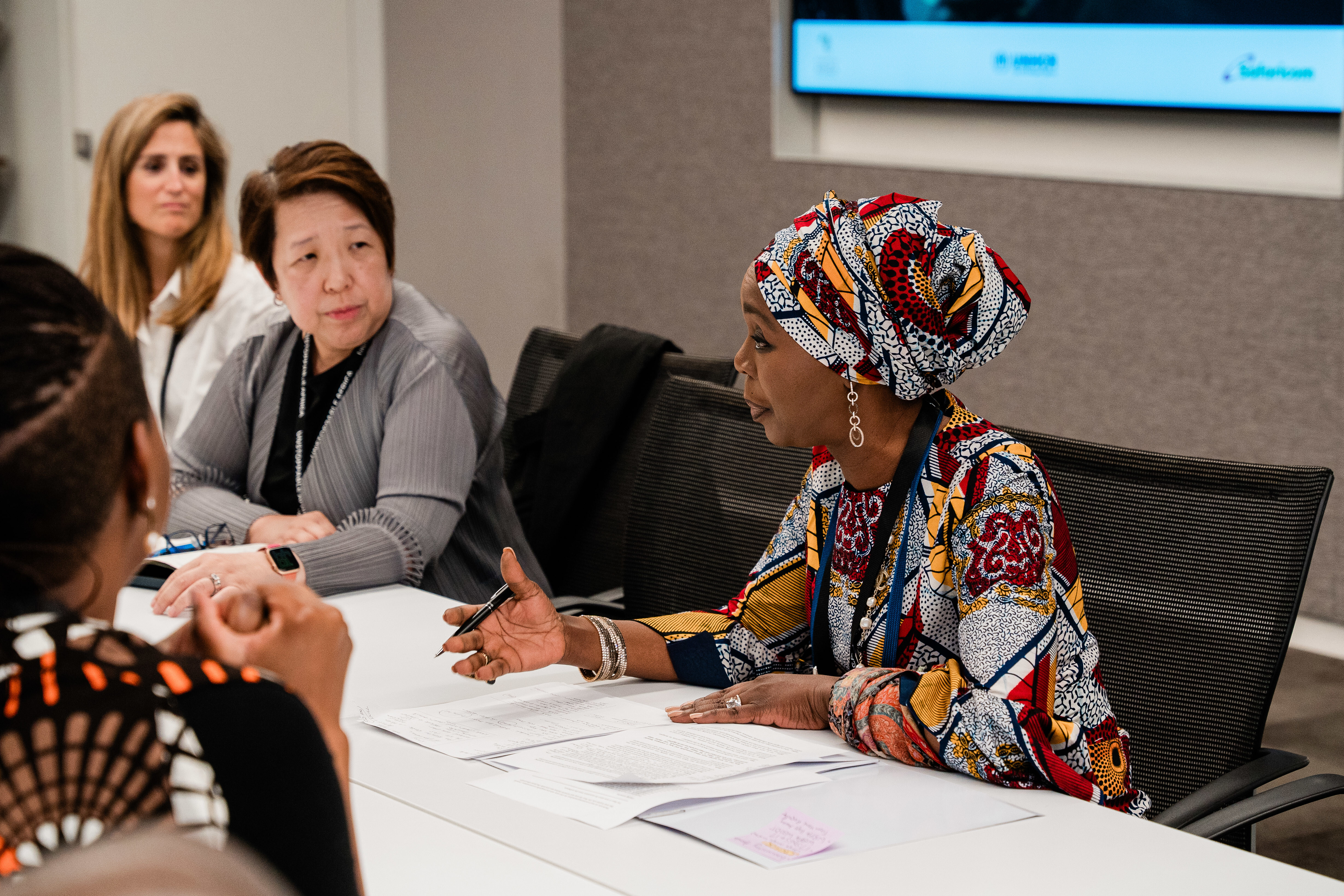 Woman talking at a meeting