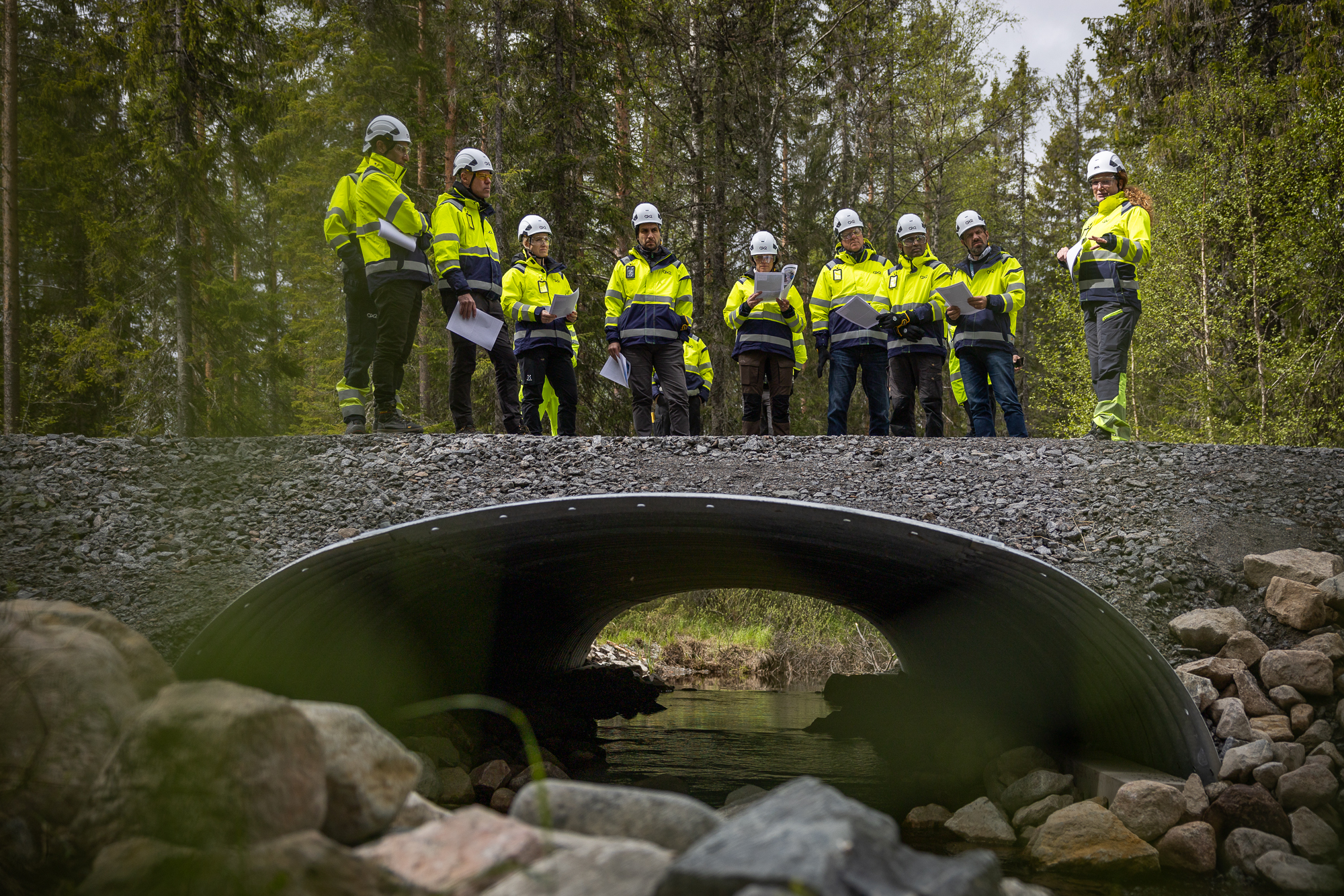workers standing on bridge