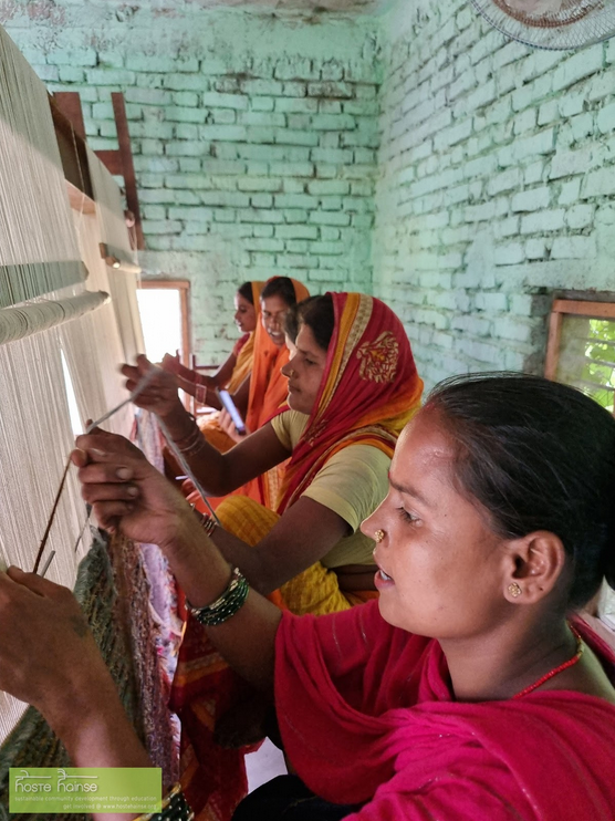Formation Carpets offers training to equip women like these, pictured, with the skills needed to become proficient carpet weavers.