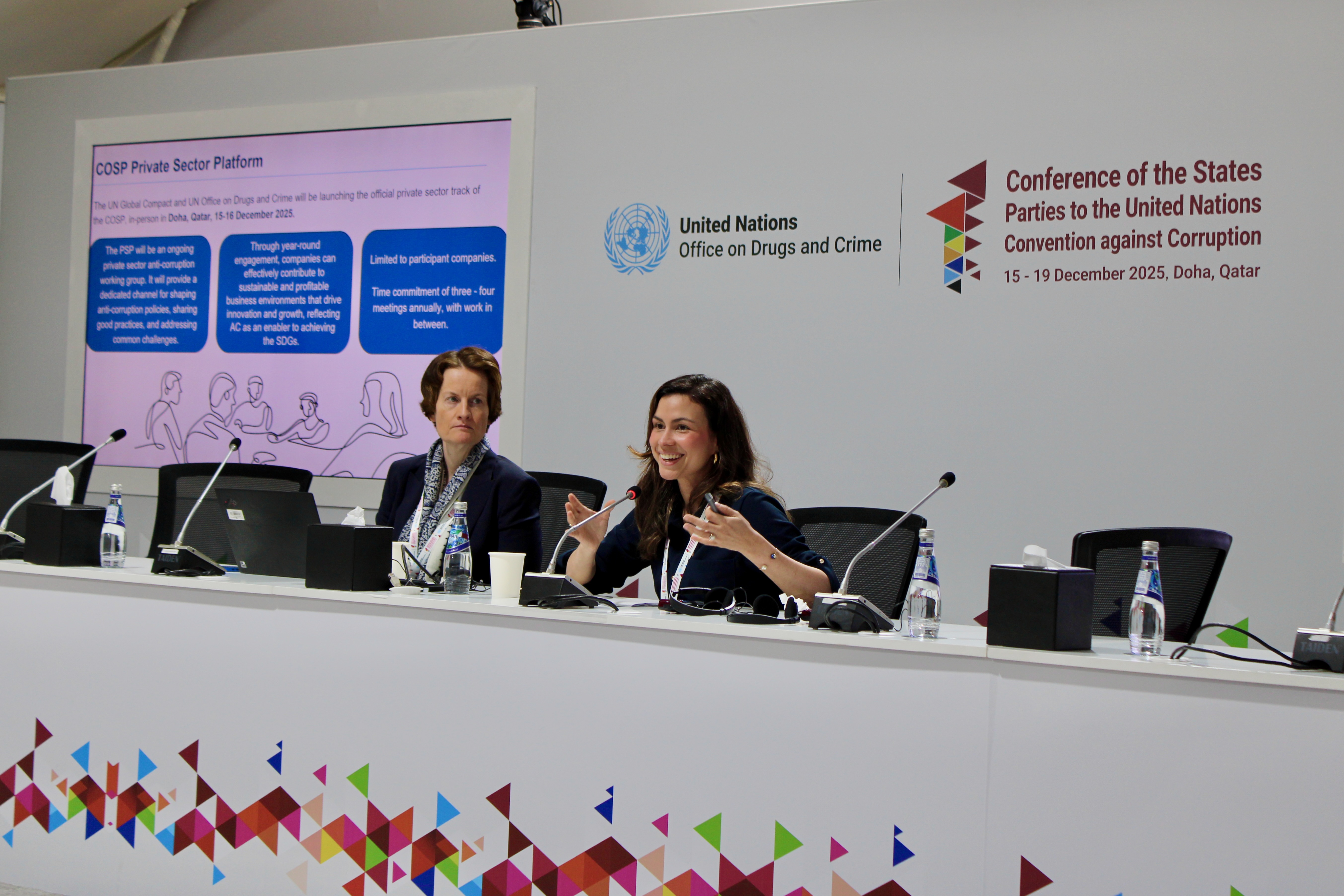 Two people at the Private Sector Platform at COSP11