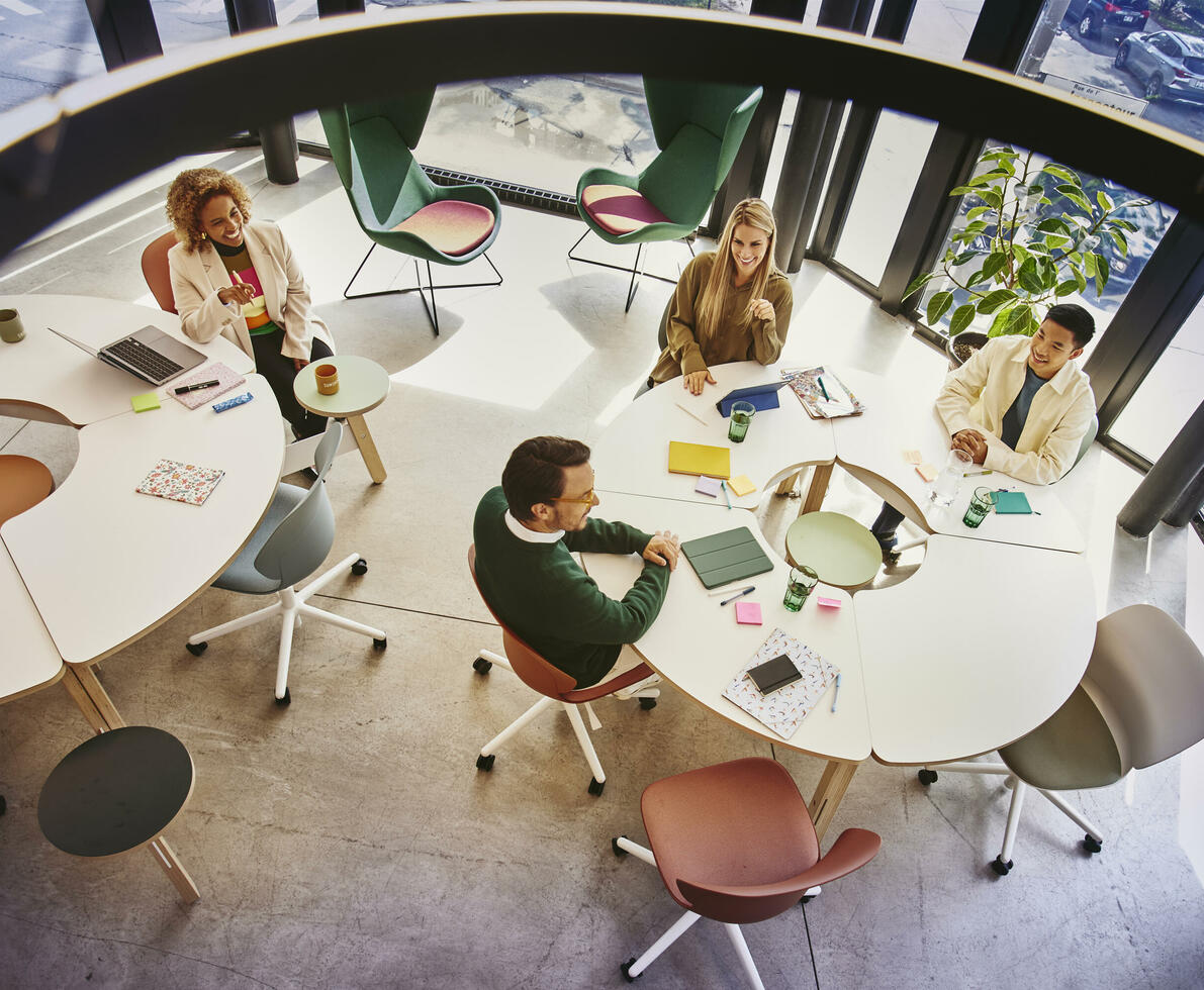 people in a meeting at workplace