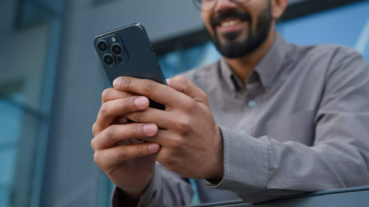 guy holding phone