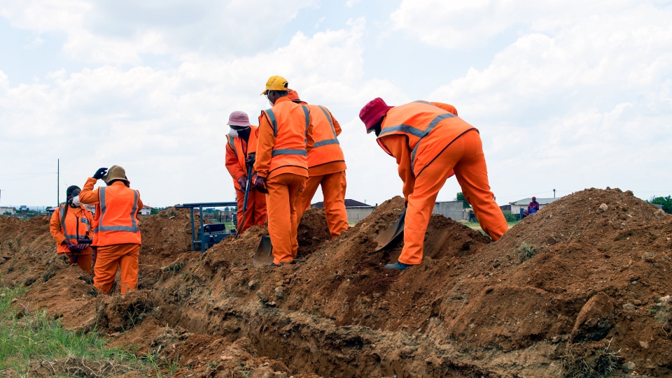 Living Wage Forward Faster Image of Employees Working