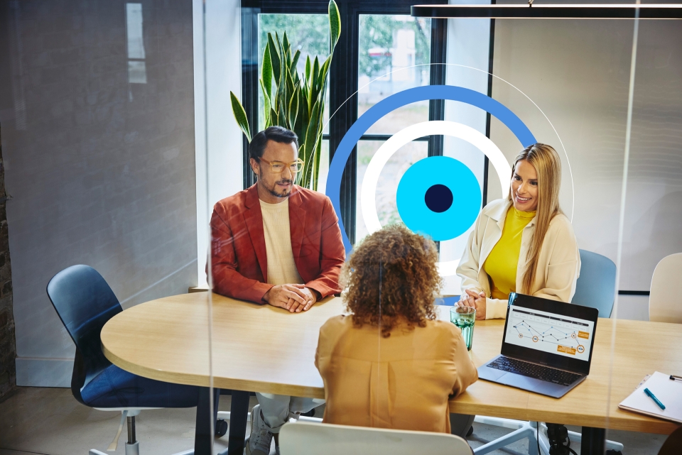 people in a meeting at the office