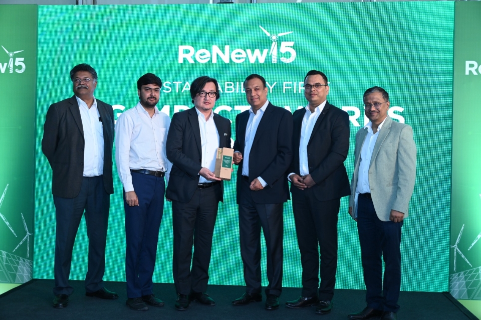A group of people receiving award