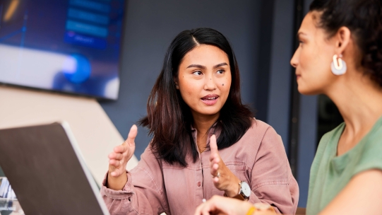 women working on computer