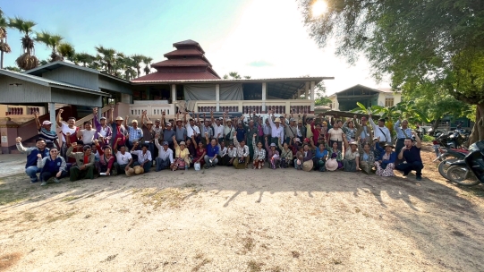Group of people in front a building